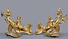 An important pair of Louis XV gilt bronze chenets attributed to Jacques Caffiéri